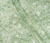 Green leaves embroidered in or