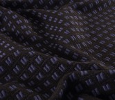 Jacquard geometrico lana berenjena